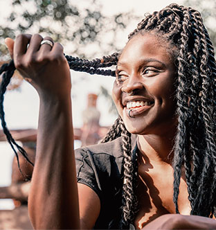 Beautify young African woman with braided hair